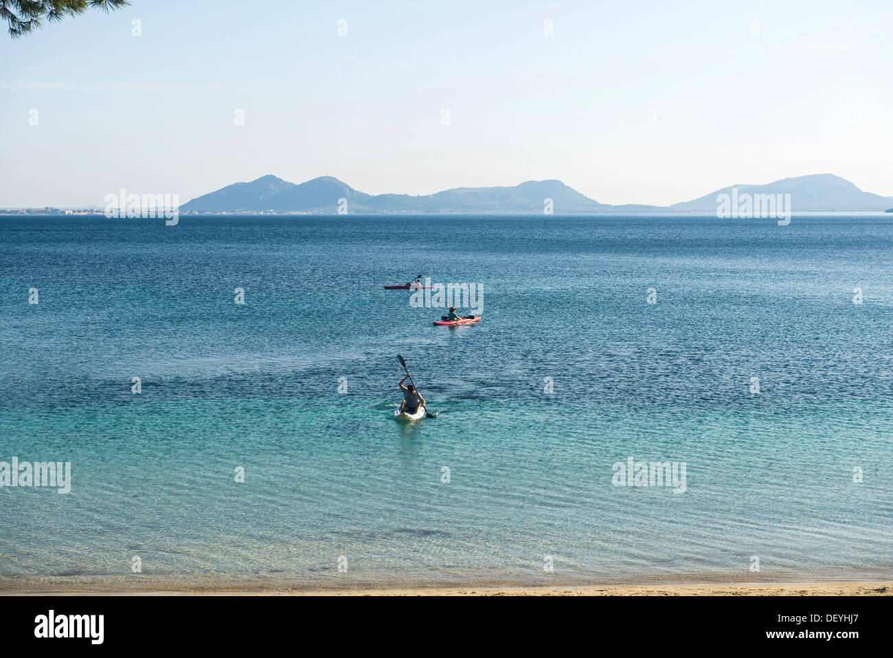 Bay and kayakers, Cala Formentor, Pollença, Serra de Tramuntana, Majorca, Balearic Islands, Spain Stock Photo