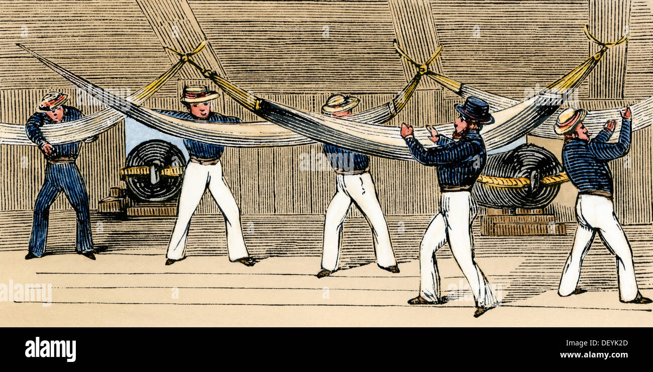 Sailors lashing their hammocks on a British man o'war, 1850s. Hand-colored woodcut Stock Photo