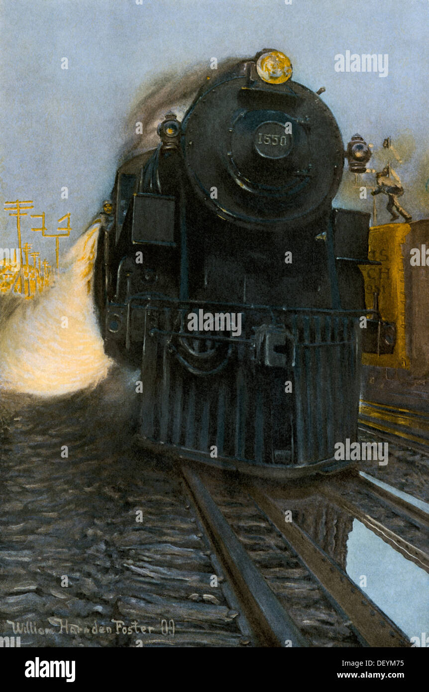 Steam locomotive scooping water, early 1900s. Printed color halftone of an illustration Stock Photo