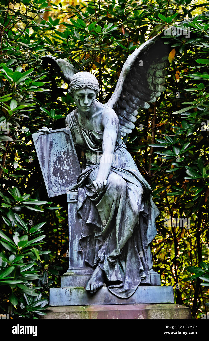 Historical angel statue on the Ohlsdorf cemetery in Hamburg Stock Photo