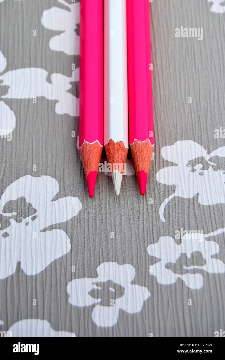 Several pencils on flowery background, creativity Stock Photo