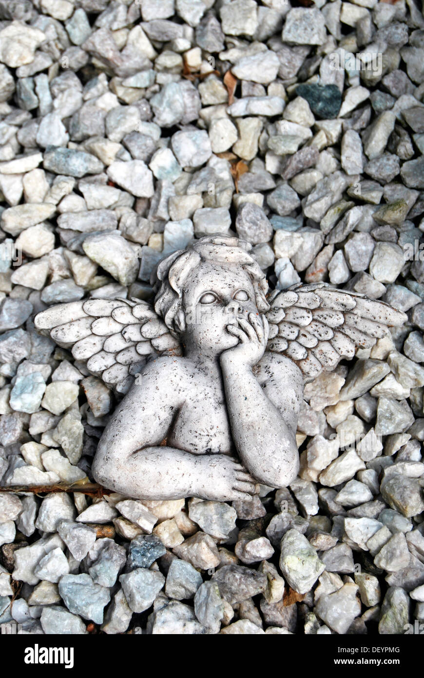 White angel, stones, gravel Stock Photo