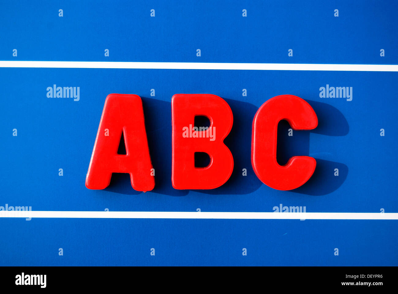 ABC, red magnetic letters, blackboard Stock Photo - Alamy