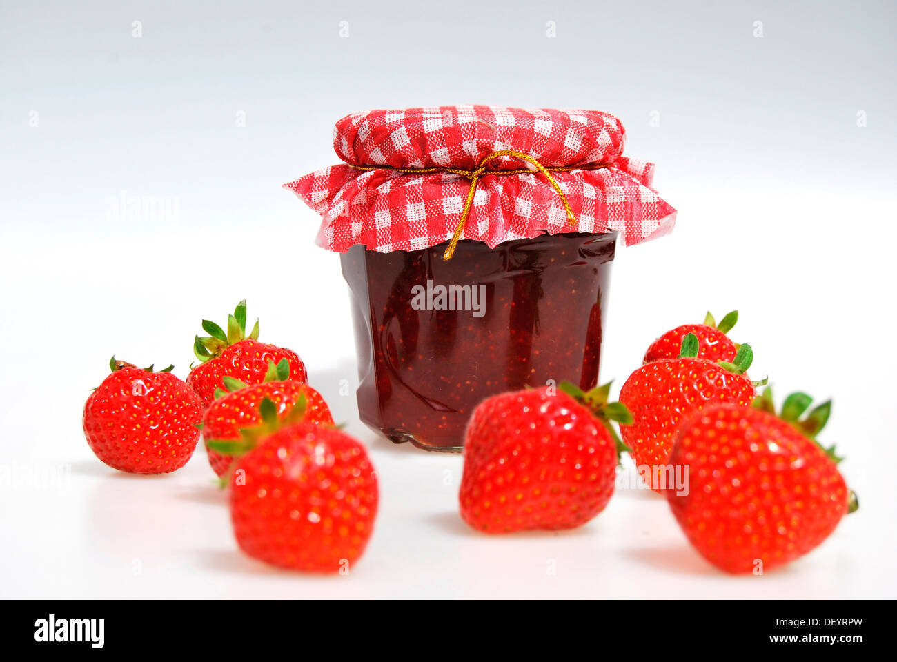 Homemade strawberry jam and strawberries Stock Photo