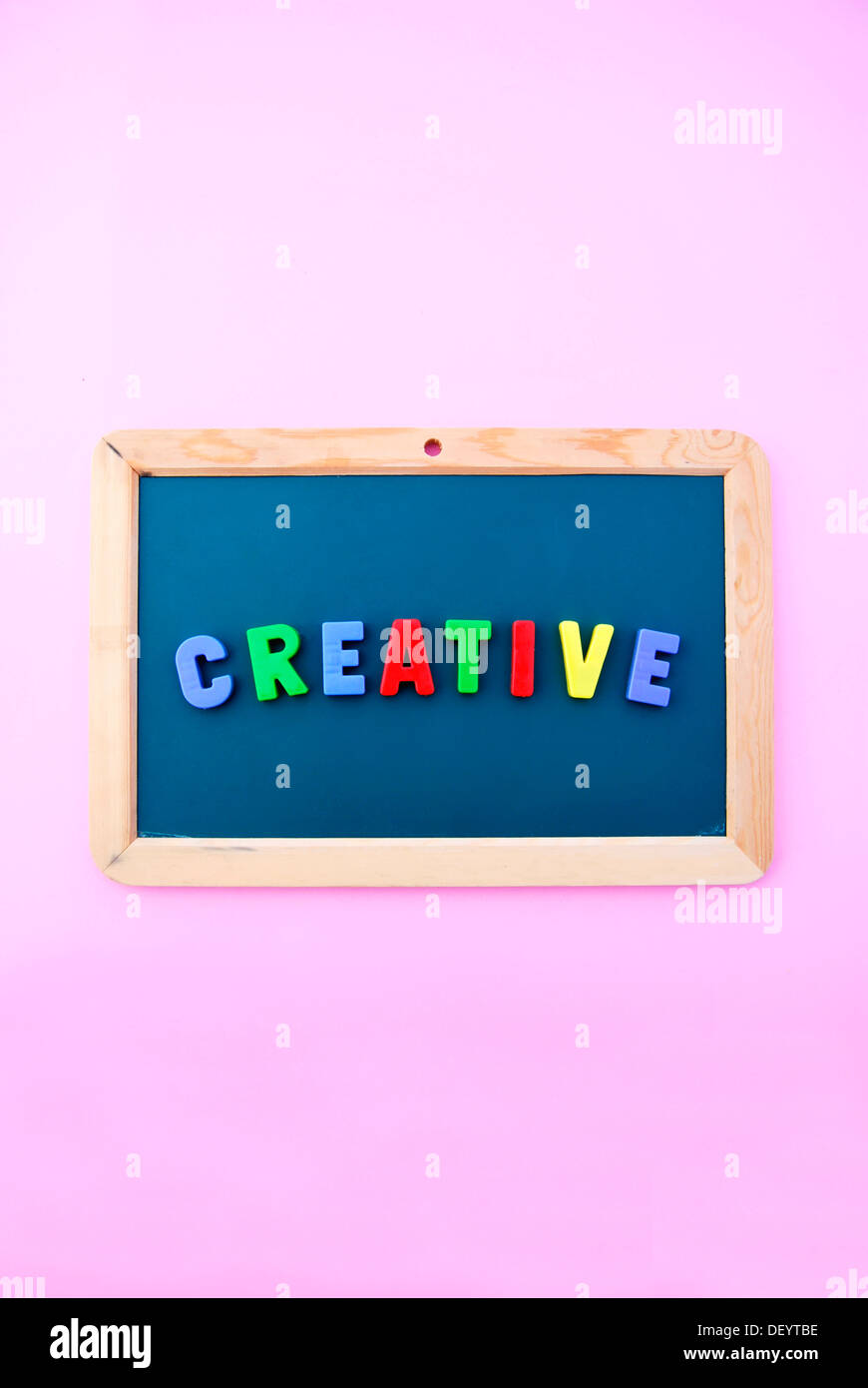 Creative, colourful letters on a school blackboard Stock Photo