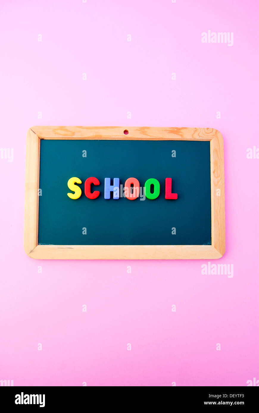School, lettering, multicoloured magnetic letters, blackboard Stock Photo