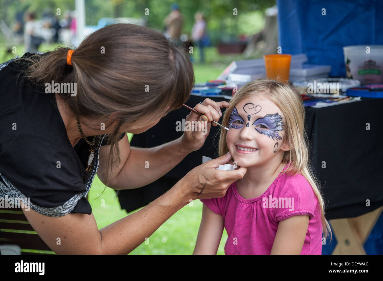 Face painting at Medieval Festival, upstate New York, Montgomery County Stock Photo