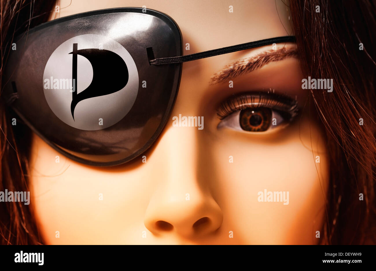 Shop-window mannequin wearing an eye patch, symbolic image for the Pirate Party of Germany Stock Photo