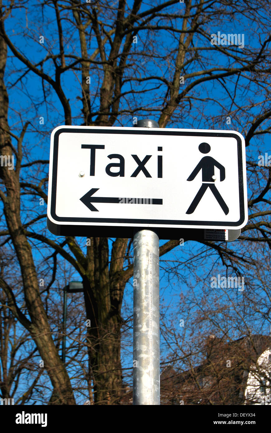 Taxi sign with an arrow and a pictogram of a man walking, traffic signs, Duesseldorf, North Rhine-Westphalia Stock Photo