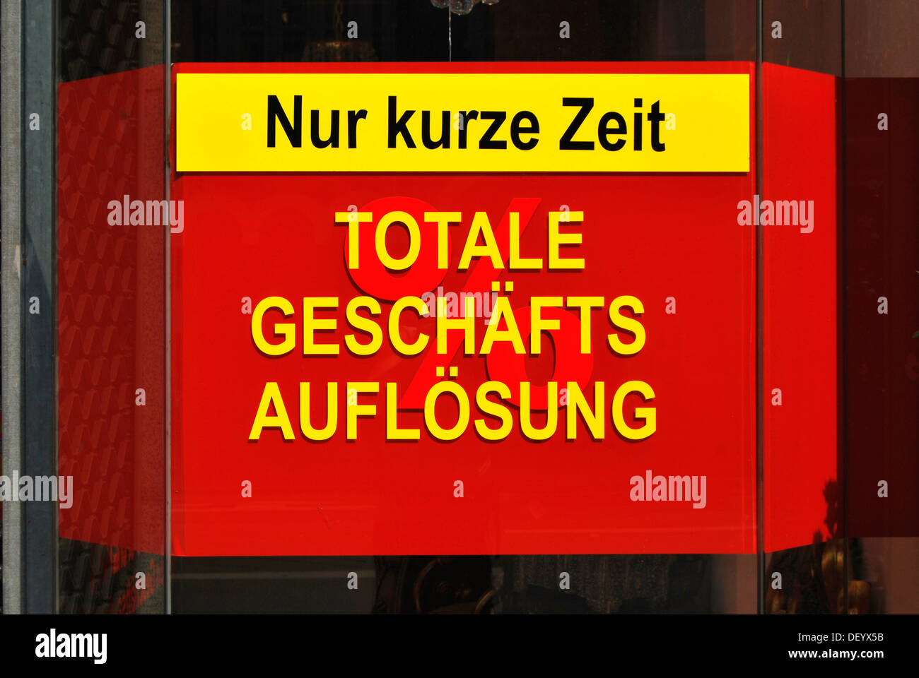 Nur kurze Zeit, Totale Geschaeftsaufloesung or Only a short time, total liquidation, sign, bankruptcy and limited time offers Stock Photo