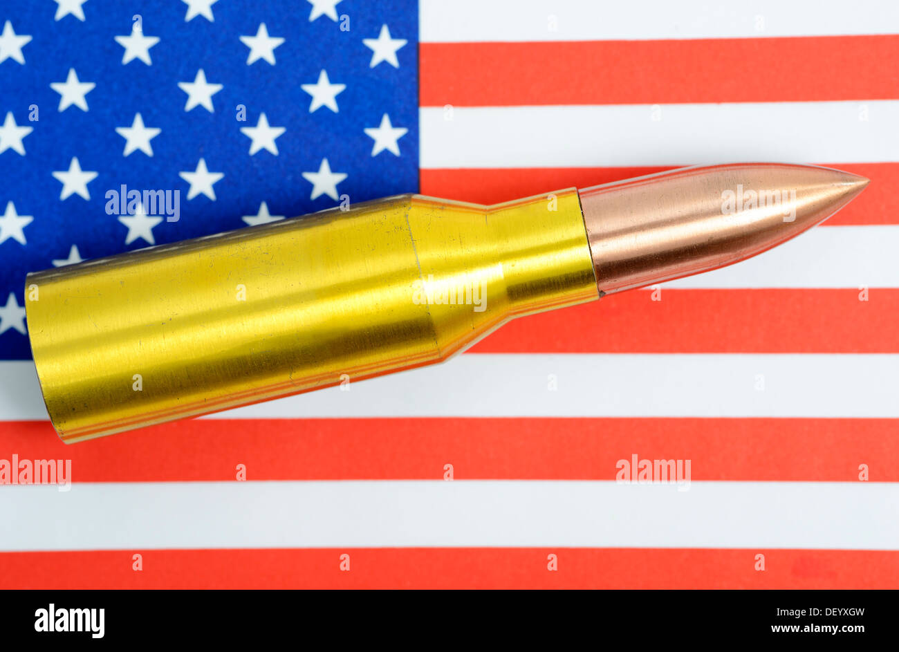 Cartridge on USA flag, terror warning, Patrone auf USA-Fahne, Terrorwarnung Stock Photo
