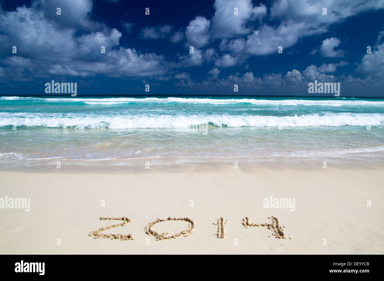 2014 year on the sand beach near the ocean Stock Photo