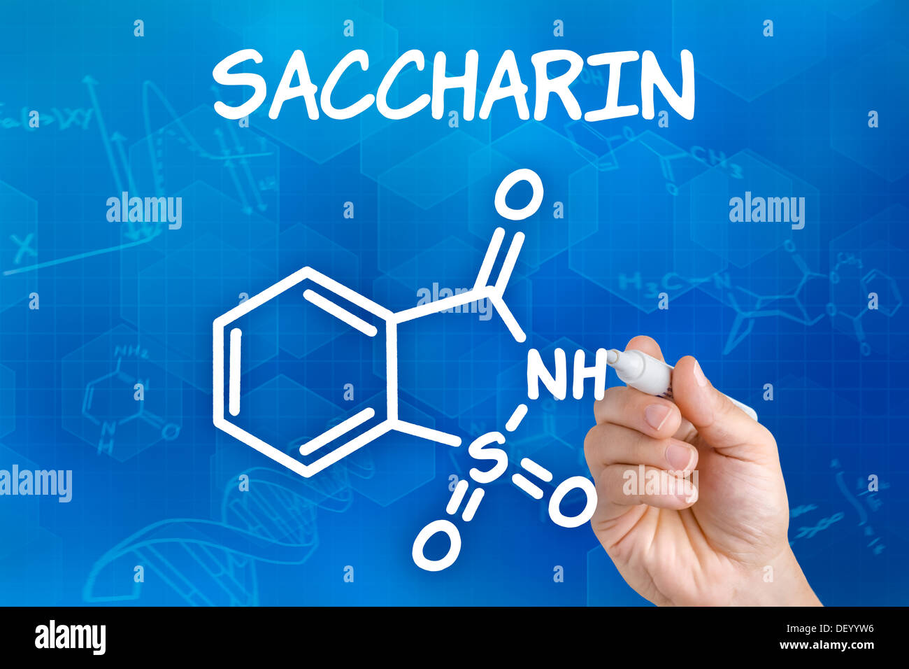 Hand with pen drawing the chemical formula of saccharin Stock Photo Alamy
