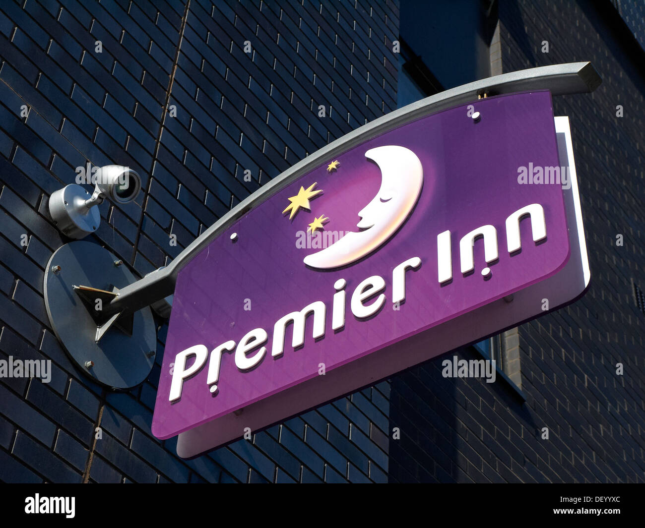 Premier Inn hotel sign on outside wall UK Stock Photo