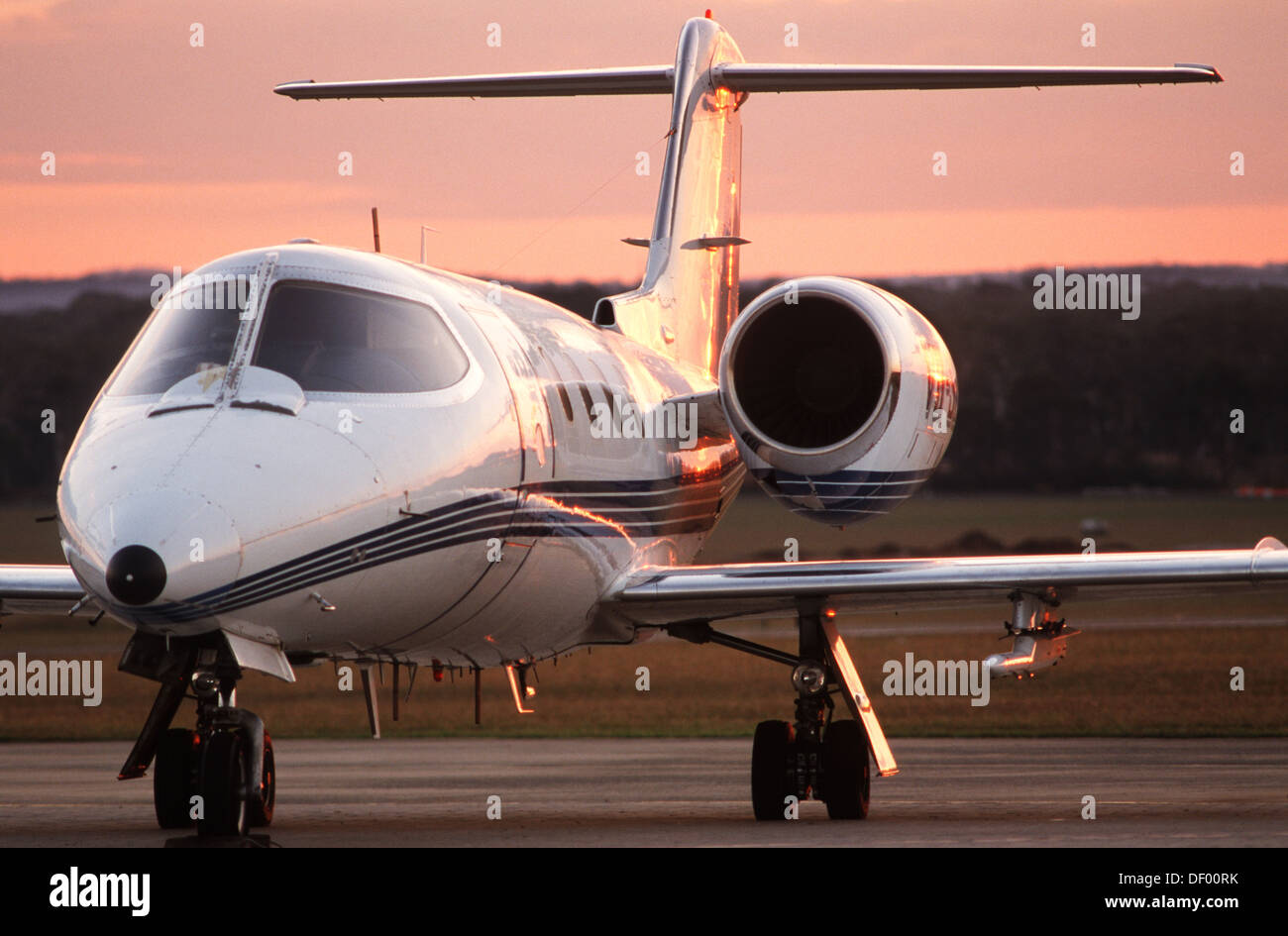 Learjet parked on airport apron Stock Photo