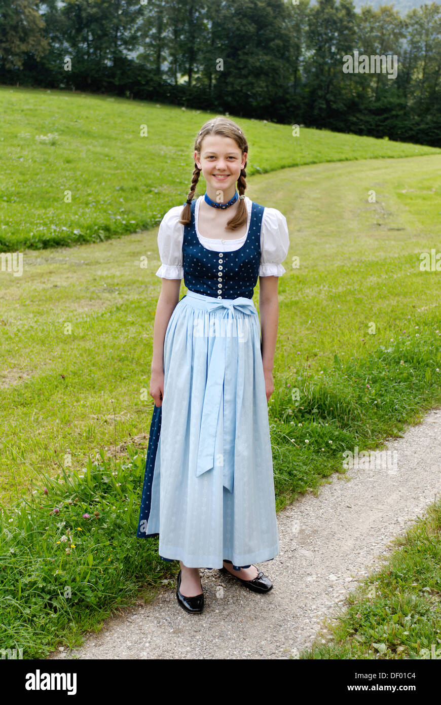 Young girl with Dirndl bavarian traditional costume Stock Photo - Alamy