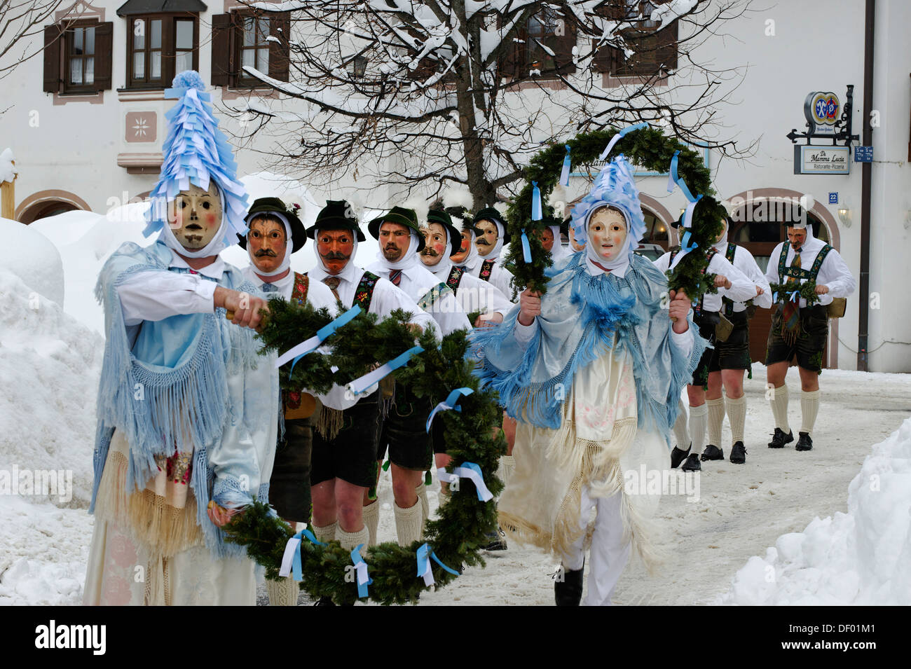 Men with bells, traditional carnival costumes, carnival parade