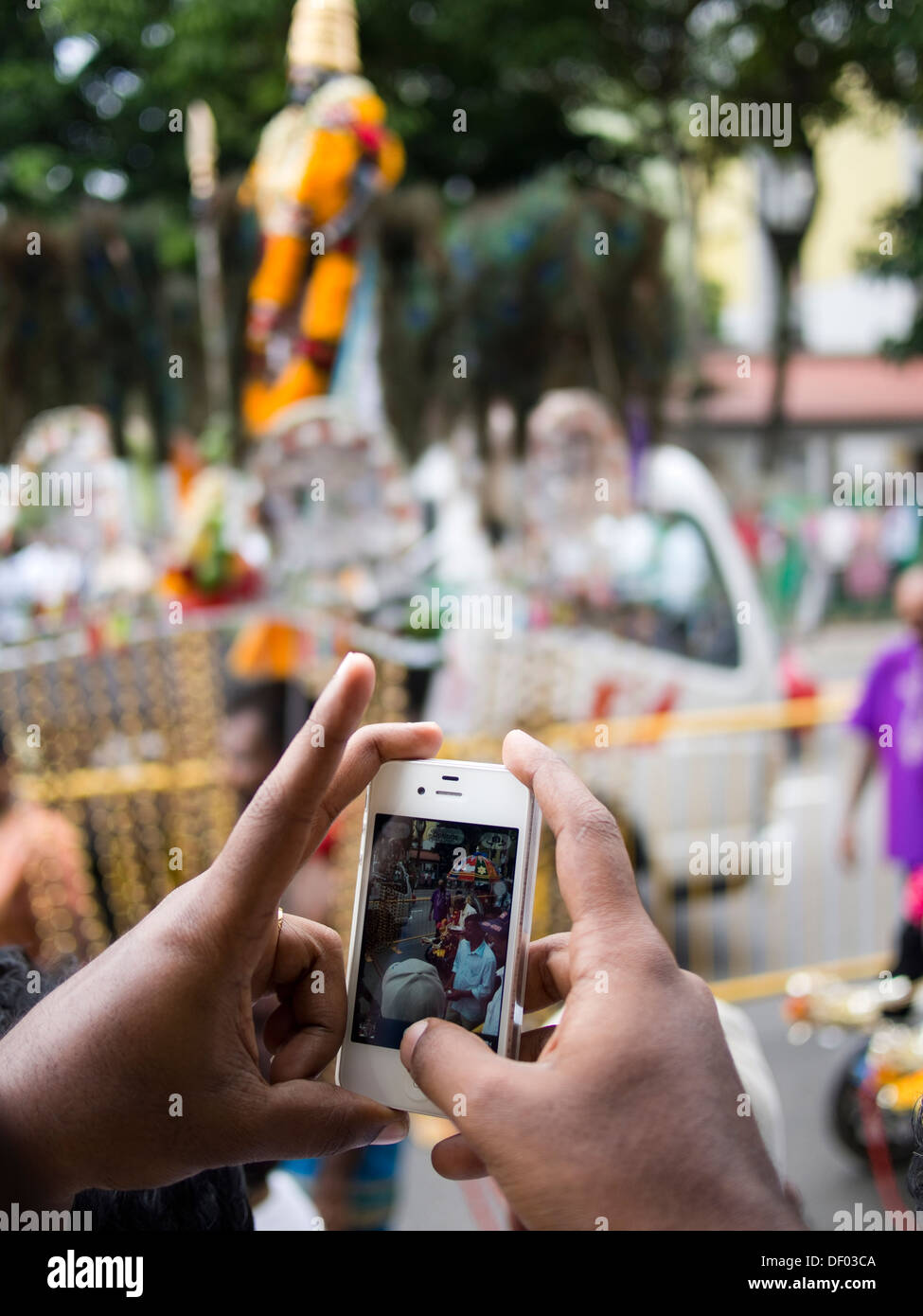 People using technology in a crowd hi-res stock photography and images ...