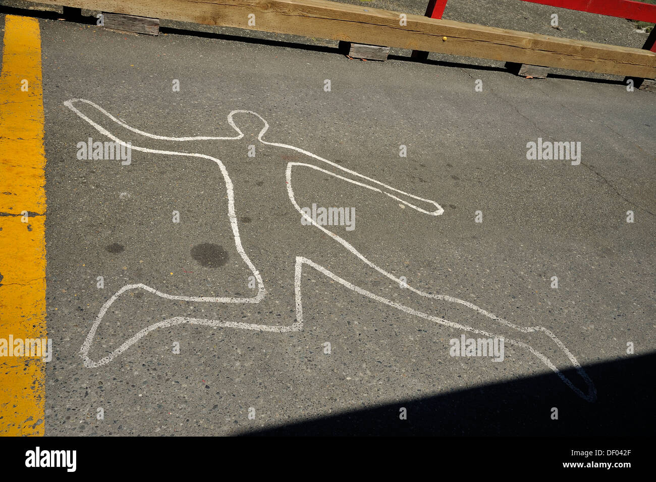 The chalk outline showing where a person had been laying Stock Photo