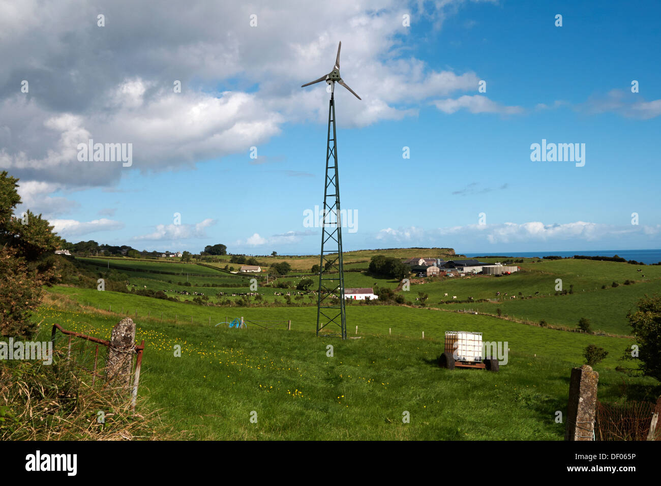 small wind turbine powering remote rural farm in northern ireland Stock Photo