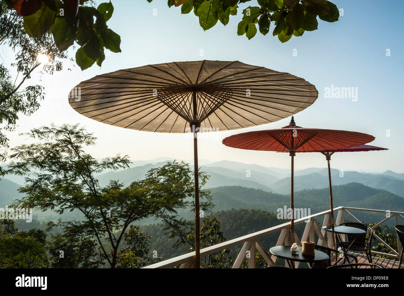 Parasols on café terrace with a view, Temple complex of Wat Phra That Doi  Kong Mu, Mae Hong Son, Northern Thailand, Thailand Stock Photo - Alamy