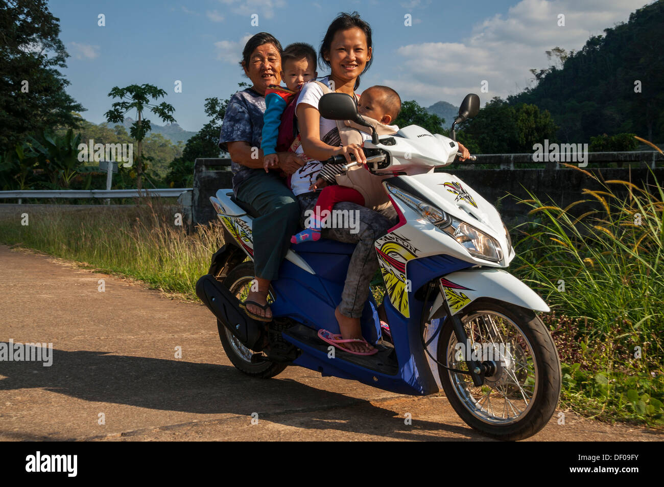 Women and children on a motorbike, northern Thailand, Thailand, Asia