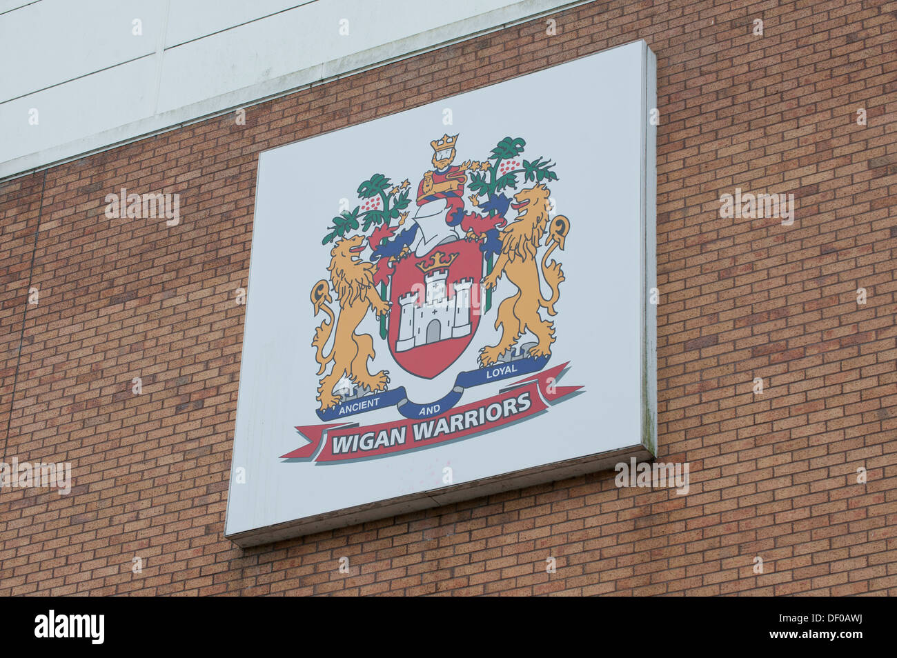 The Wigan Warriors Rugby League Football Club emblam as seen on the side of the DW Stadium (Editorial use only). Stock Photo