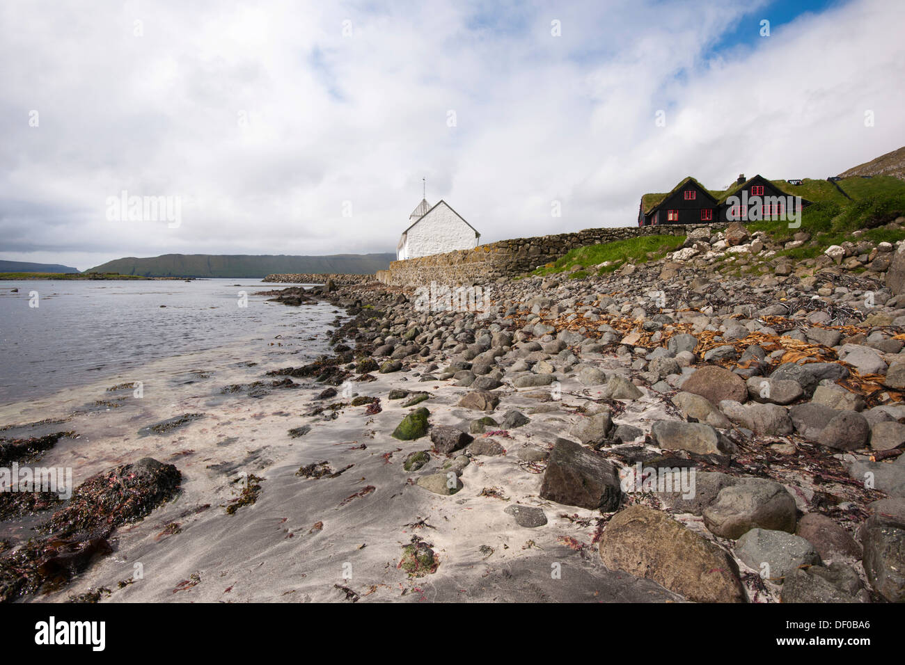 New church by the sea, Kirkjubour, Streymoy Island, Faroe Islands, Denmark, North Atlantic, Northern Europe, Europe Stock Photo