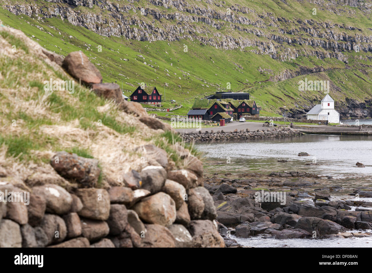 New church by the sea, Kirkjubour, Streymoy Island, Faroe Islands, Denmark, North Atlantic, Northern Europe, Europe Stock Photo