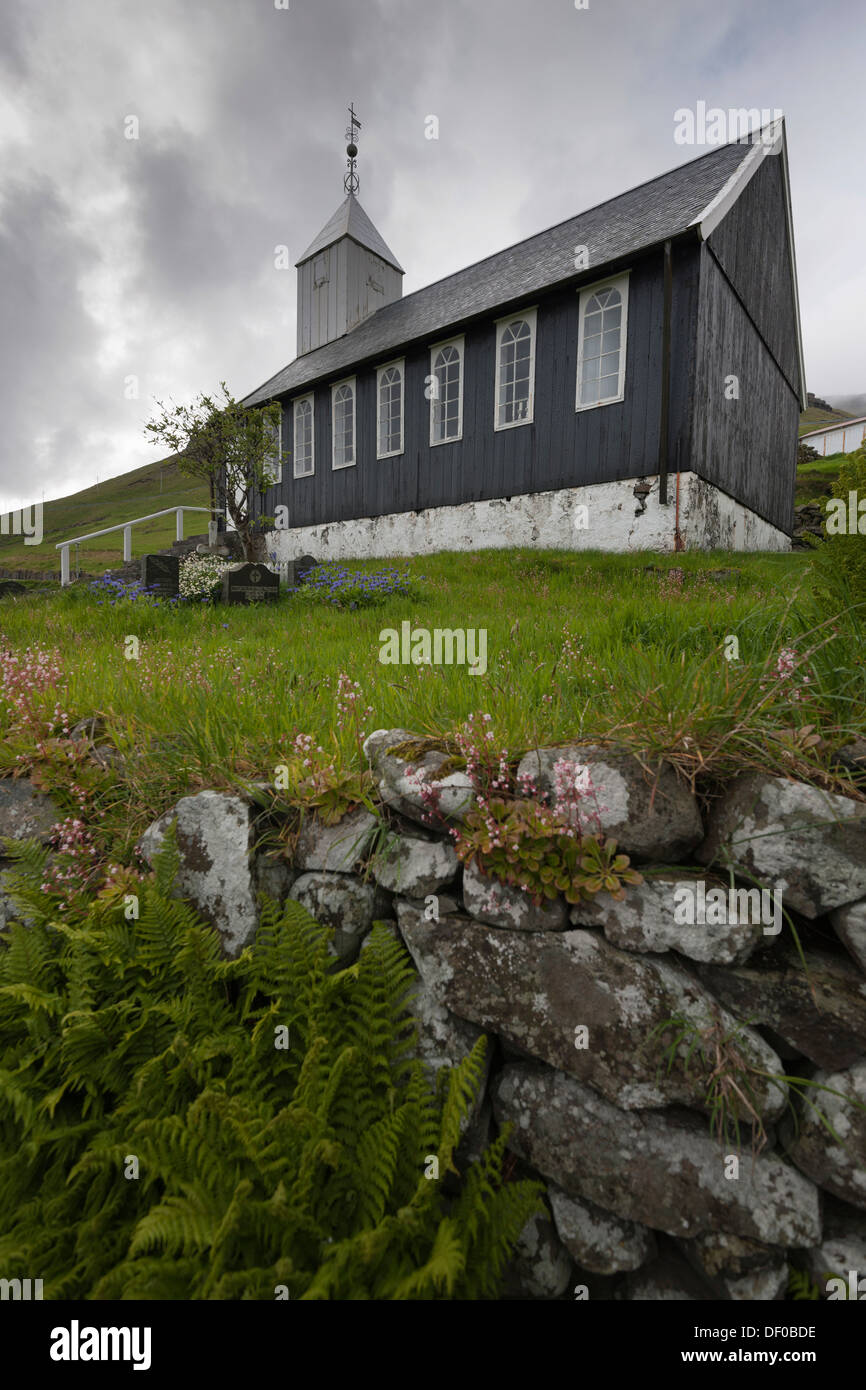 Small cemetery, wooden church in the community of Bour on Vágar Island, Faroe Islands, North Sea, Northern Europe, Europe Stock Photo