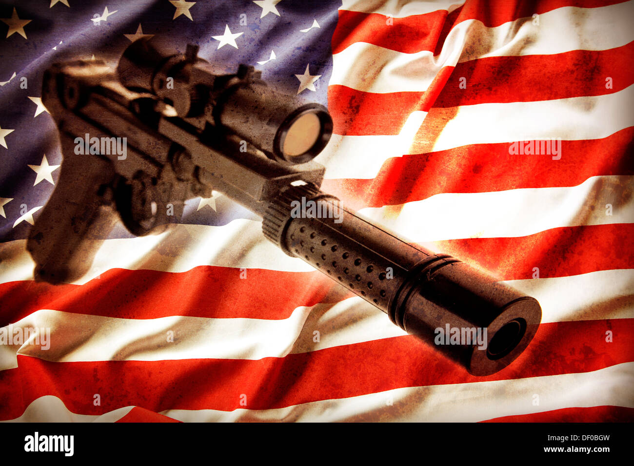 Handgun and American flag. Gun control concept. Stock Photo