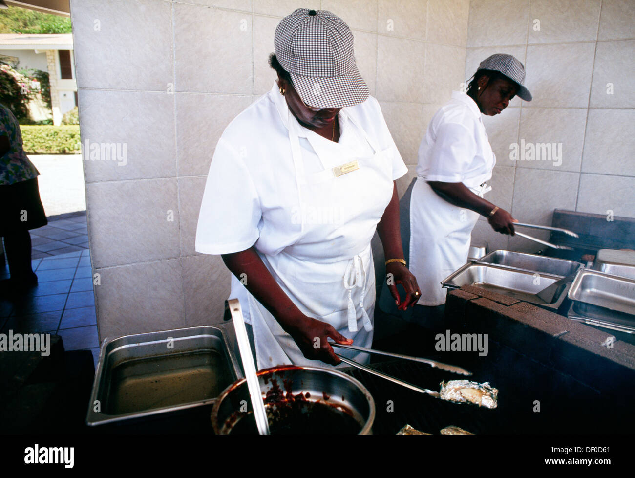 Dickenson Bay Antigua Rex Halcyon Cove Hotel Beach Bbq - Caribbean Cooks Stock Photo