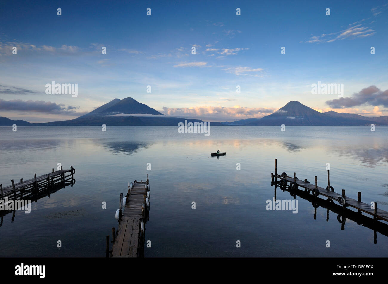 Lake Atitlan, San Pedro volcano, Toliman volcano, Atitlan, fisherman, Guatemala, Central America Stock Photo