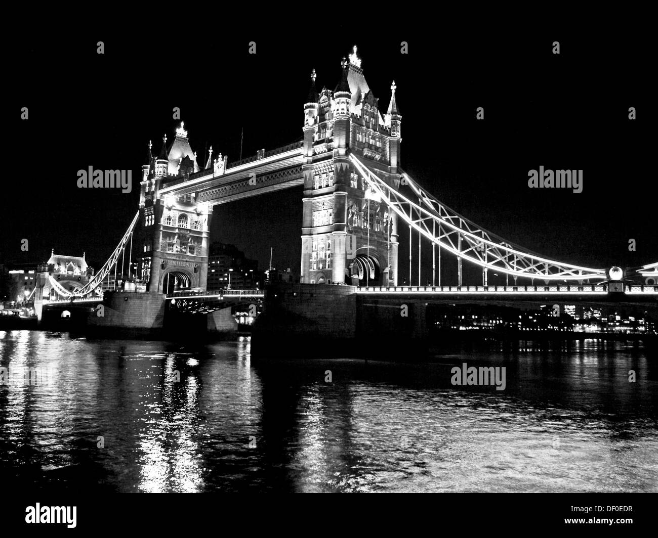 View of the Tower Bridge at night showing the River Thames, London, England, United Kingdom Stock Photo