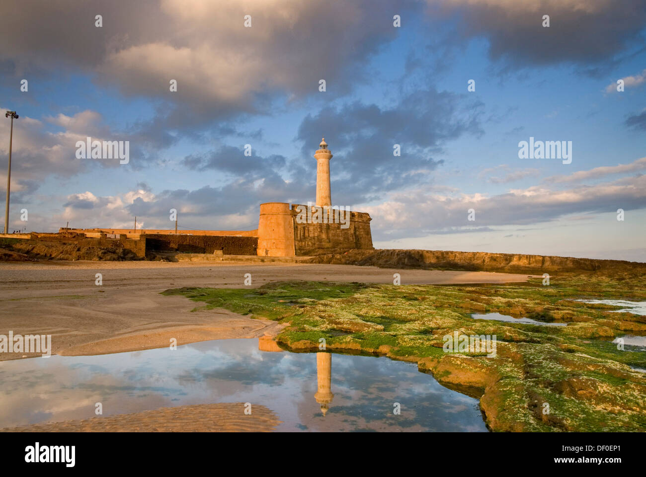Clouds and blue sky above the lighthouse of Rabat, Phare de Rabat, and ...