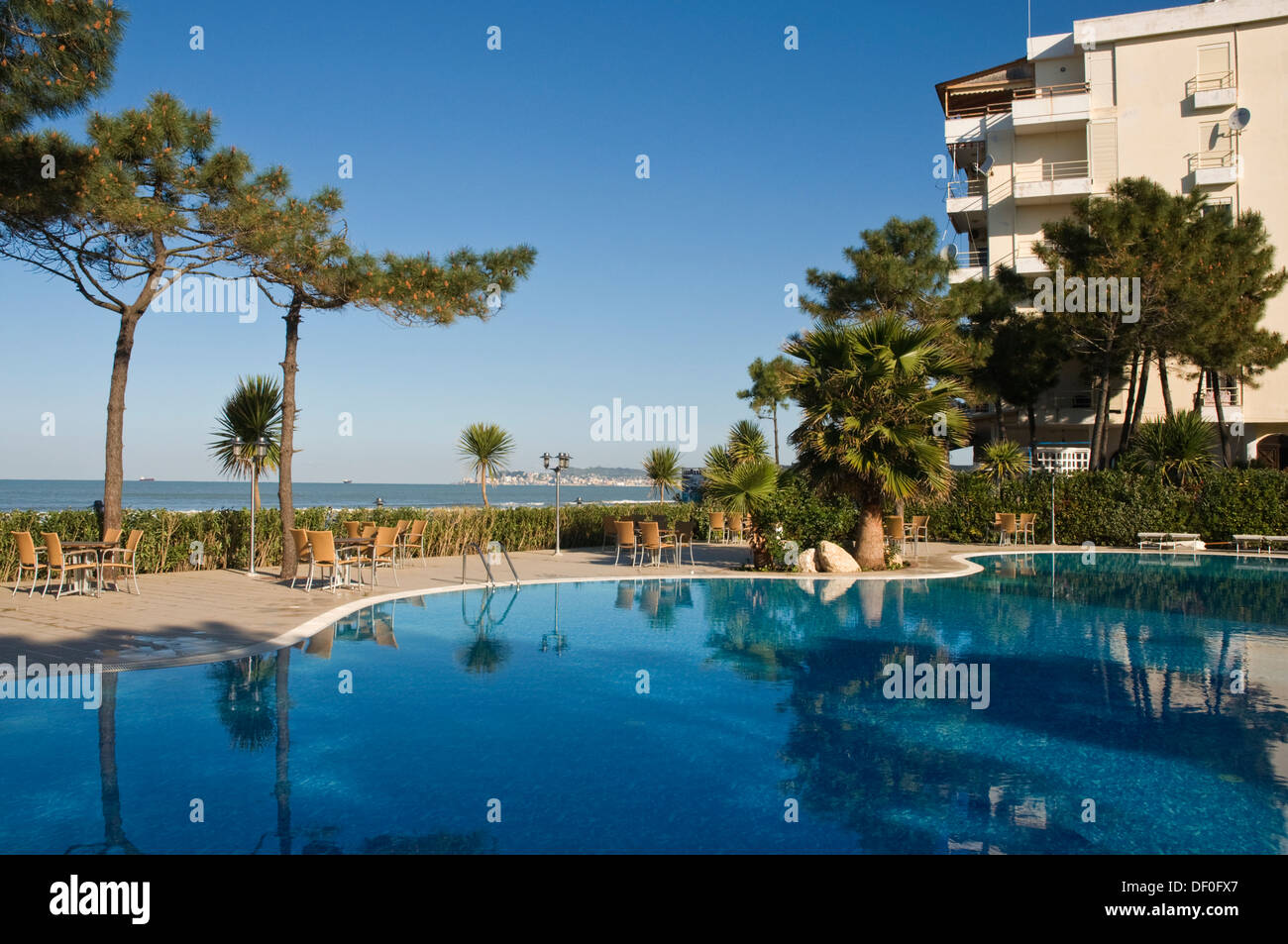 EUROPE, Albania, Durres, Hotel Dolce Vita, hotel swimming pool with Adriatic Sea behind Stock Photo