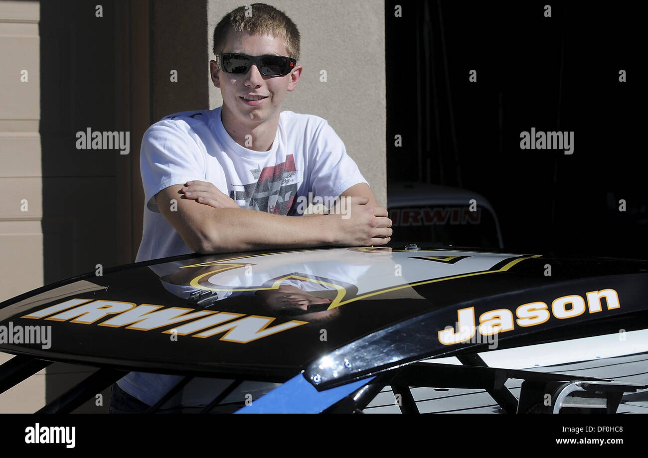 Albuquerque, NM, USA. 25th Sep, 2013. La Cueva High School Junior, Jason Irwin's with one of three cars that he will be racing in at the NASCAR K&N event Saturday night at the NAPA Speedway in Albuquerque, NM. Wednesday, Sept. 25, 2013. © Jim Thompson/Albuquerque Journal/ZUMAPRESS.com/Alamy Live News Stock Photo
