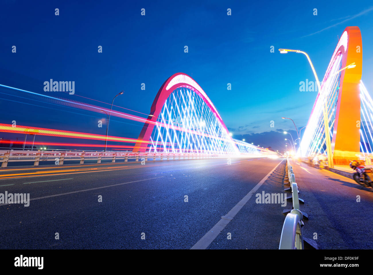 cars light trails on the modern bridge at dusk Stock Photo - Alamy