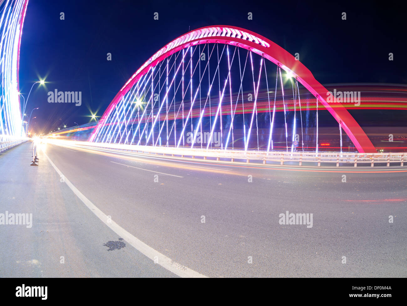 cars light trails on the modern bridge at dusk Stock Photo - Alamy