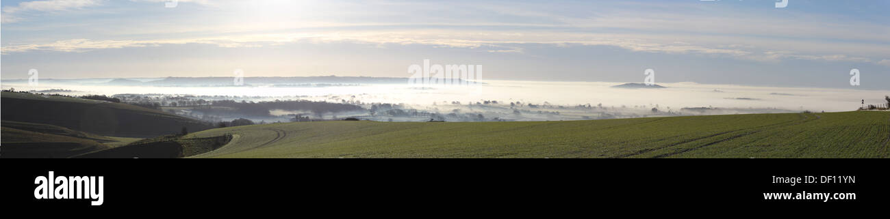 Panoramic Shot from Whitesheet Hill Early morning mist Dorset Stock Photo