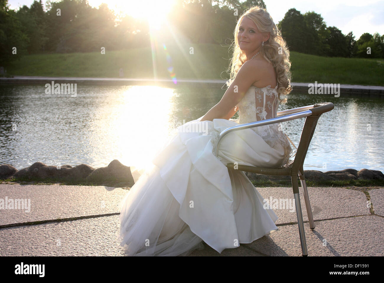 Berlin, Germany, a bride in wedding dress on the lake Stock Photo