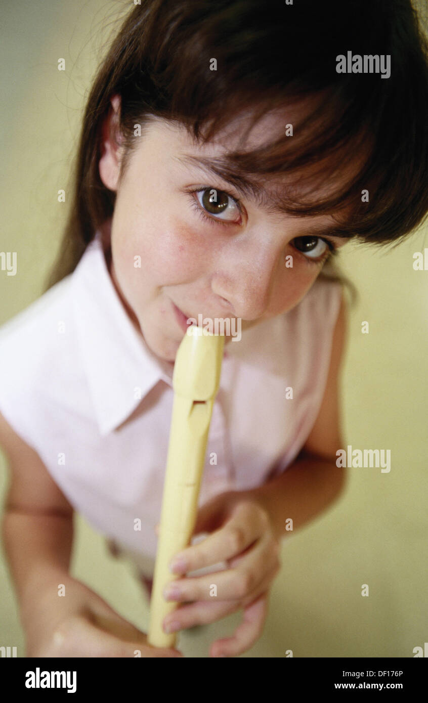 Girl playing flute Stock Photo Alamy
