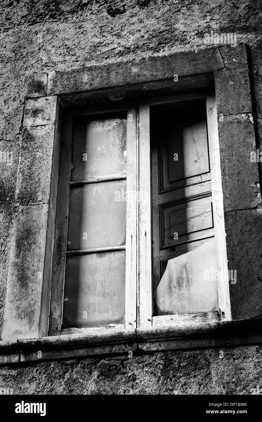 Scanno village, Italy. Window with broken glass Stock Photo