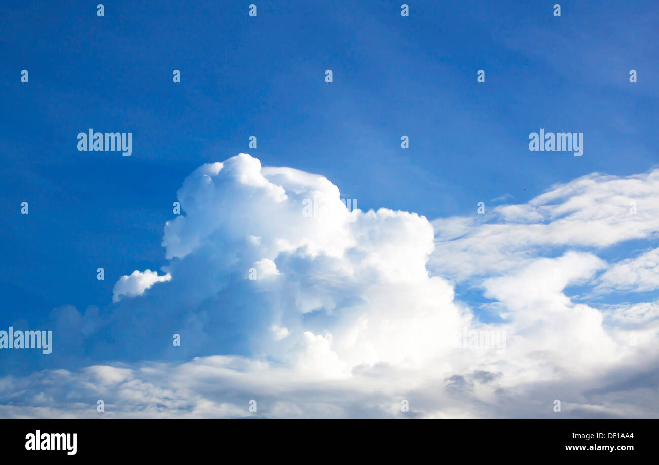 White fluffy clouds in the blue sky Stock Photo - Alamy
