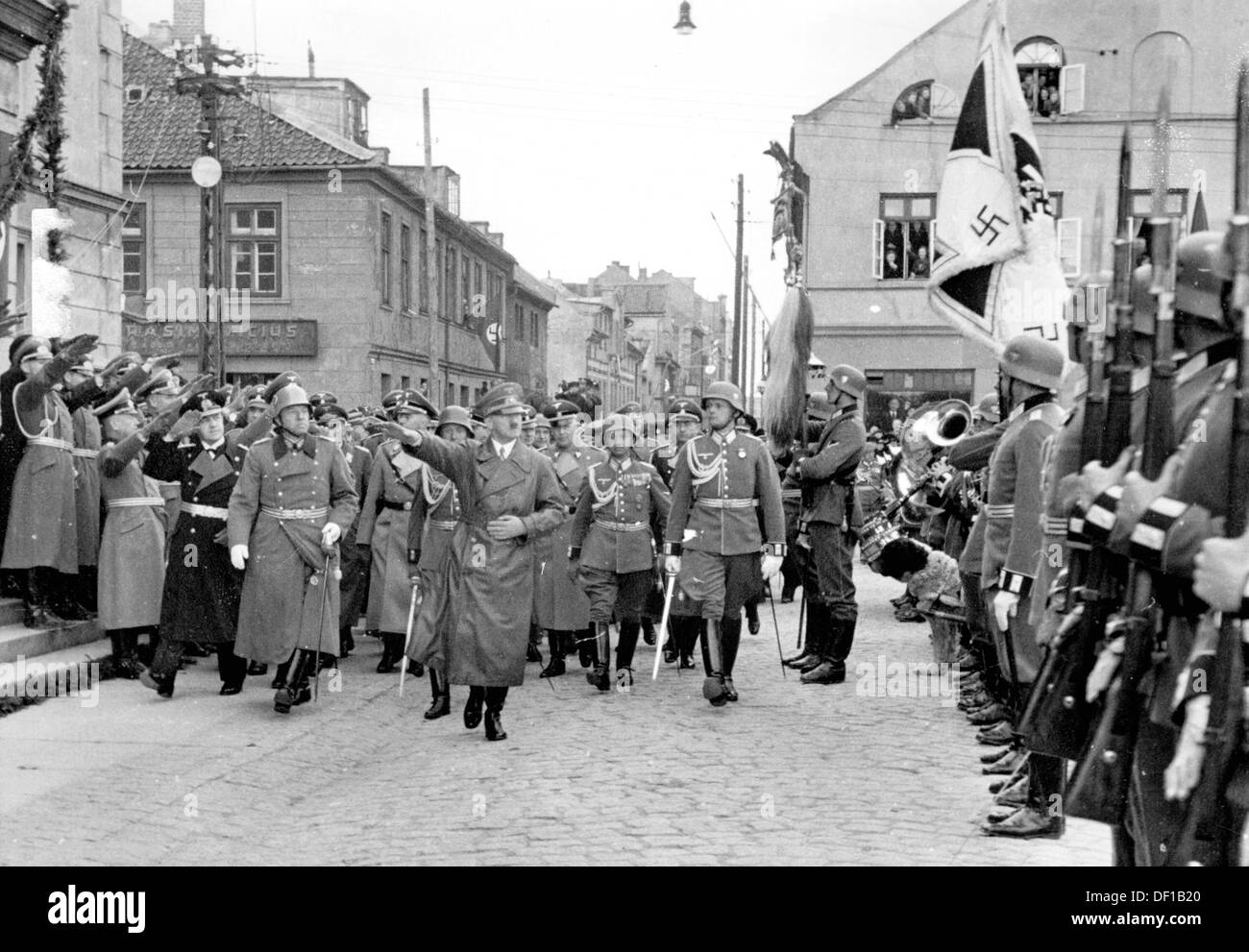 Reich Chancellor Adolf Hitler walks past an honorary company in Memel (today: Klaipeda/Lithuania) on the occasion of the handing over of the Memel Country by the Lithuanian government, on 23 March 1939. To the left in the black uniform, Admiral Erich Raeder. Fotoarchiv für Zeitgeschichte Stock Photo