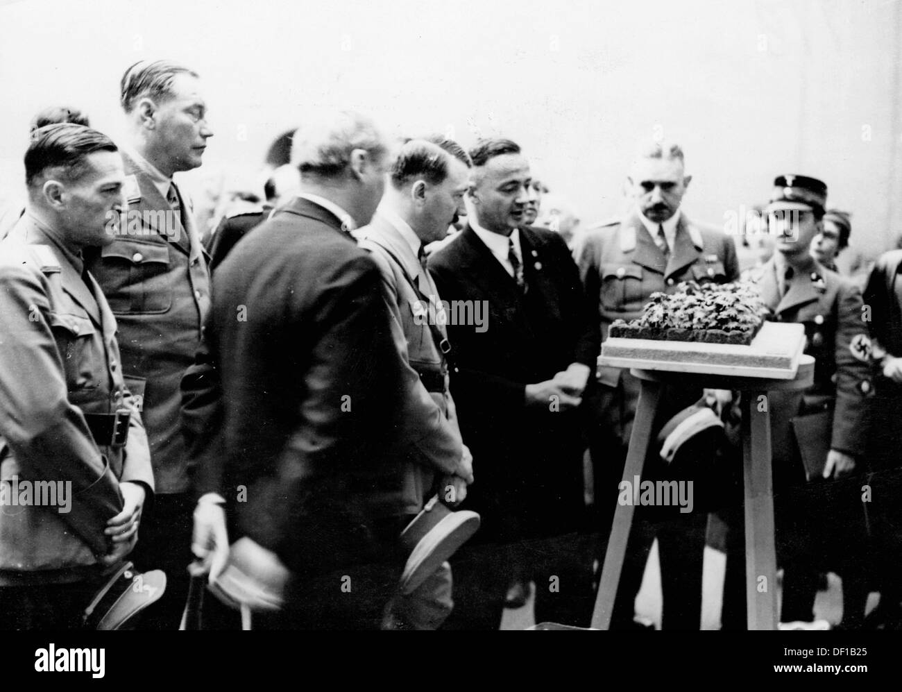 The image from the Nazi Propaganda! shows Adolf Hitler during his visit to the exhibition of the the German War Graves Commission in the city hall of Dresden, Germany, in 1934. Fotoarchiv für Zeitgeschichte Stock Photo