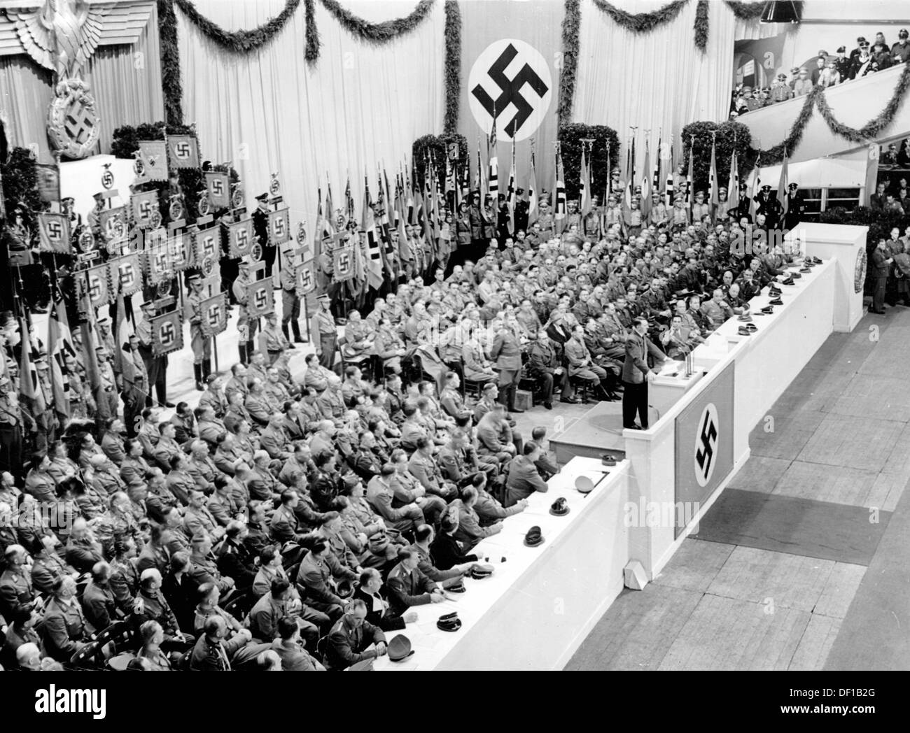 The image from the Nazi Propaganda! shows Reich Chancellor Adolf Hitler delivering a speech on the occasion of the opening of the Winterhilfswerk (Winter Relief) of the winter 1941/42 in the Sportpalast in Berlin, Germany, 3 October 1941. Fotoarchiv für Zeitgeschichte Stock Photo