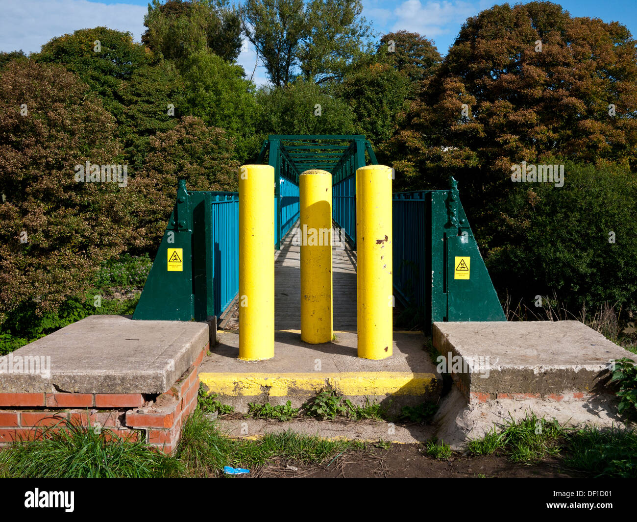 Steel Bollards on footbridge to stop cyclists and motorbikes. Stock Photo