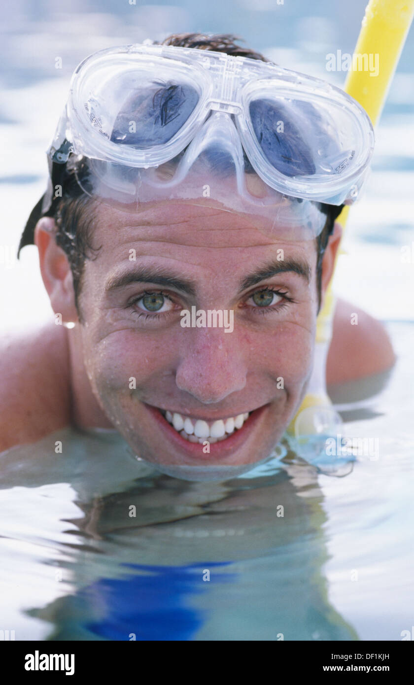 man wearing snorkel gear Stock Photo - Alamy