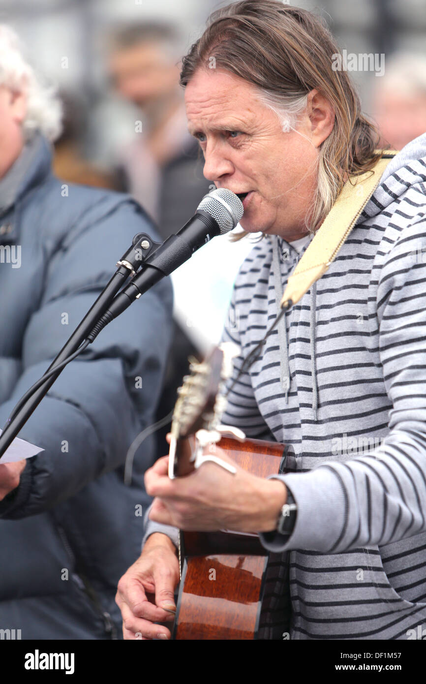 A Musician take the stage at the anti-fracking rally outside the Senedd, Cardiff bay. Stock Photo
